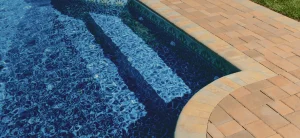 Pool Steps, Benches, and Tanning Ledges: Custom Features to Plan Early