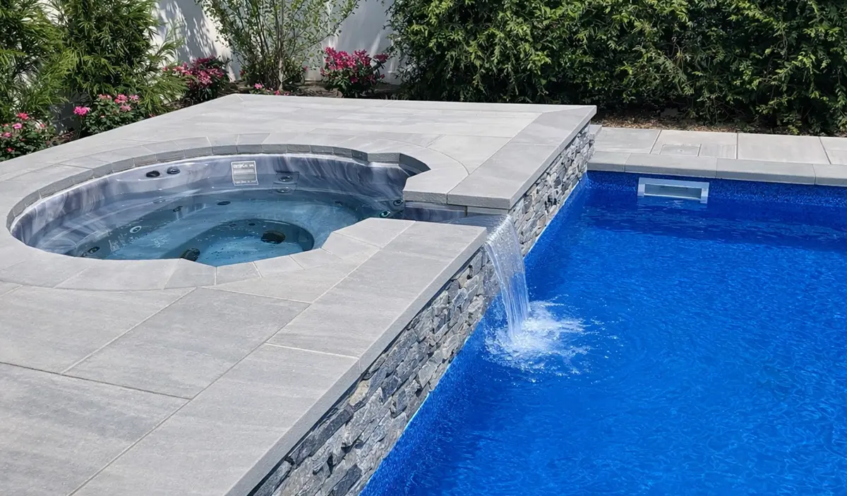 Raised Spillover Spa With Sheer Descent