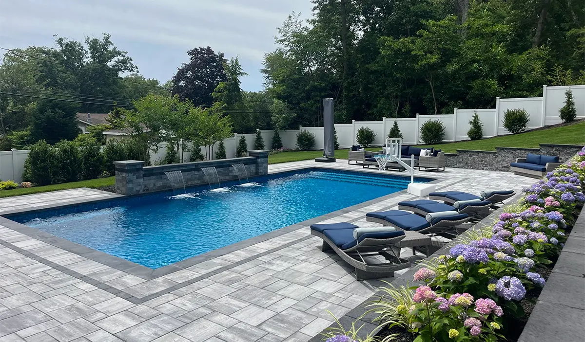 Geometric Pool with Water Features and Lounge Deck