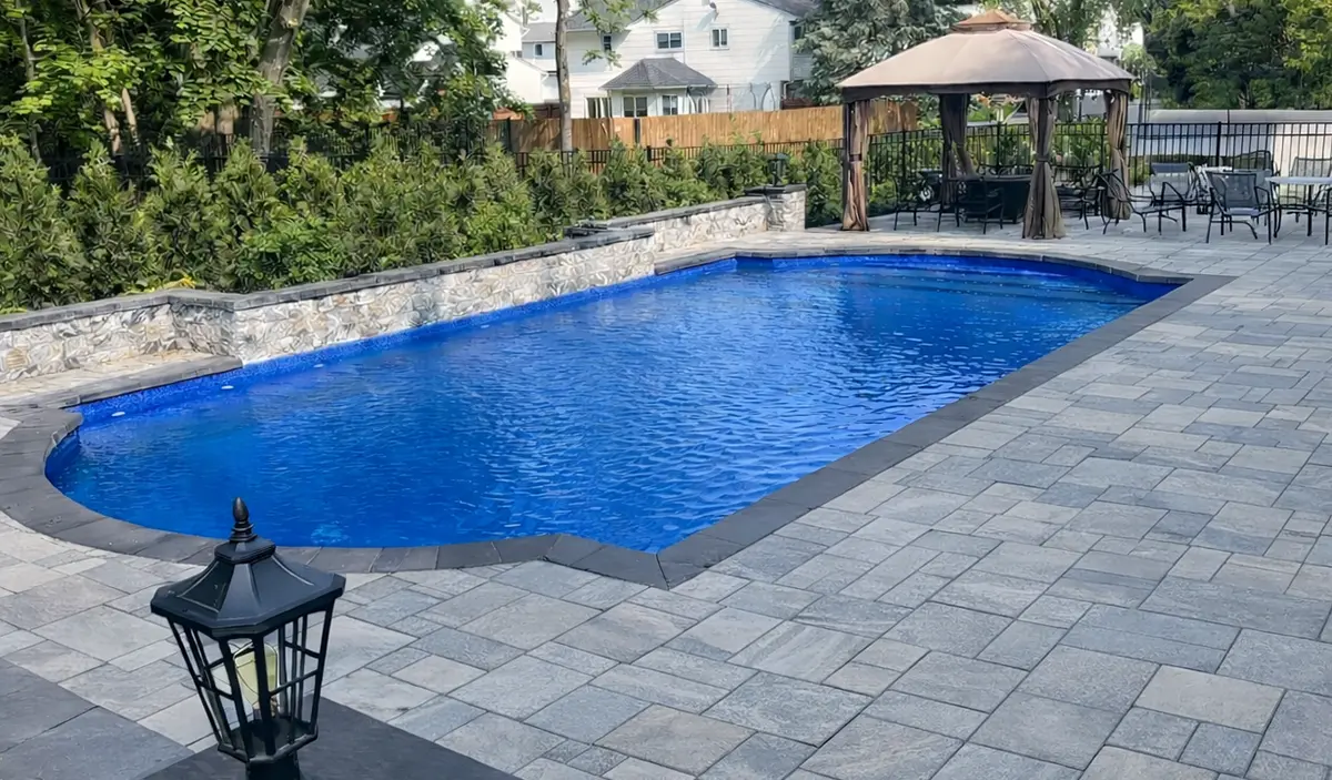 Geometric Pool with Raised Wall and Seating Area