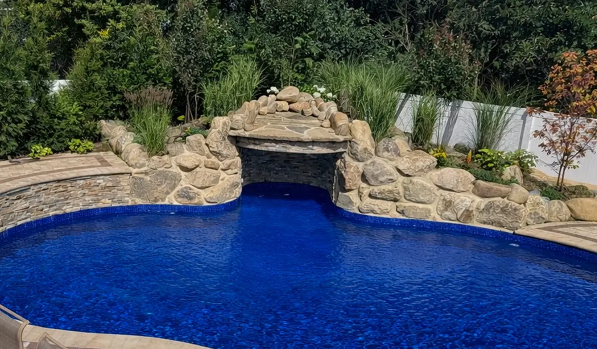 Stone Grotto with Waterfall on freeform pool