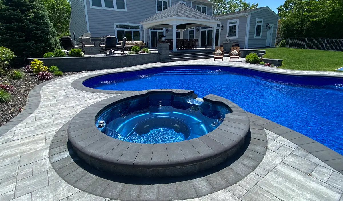 Freeform Pool with Raised Spillover Spa